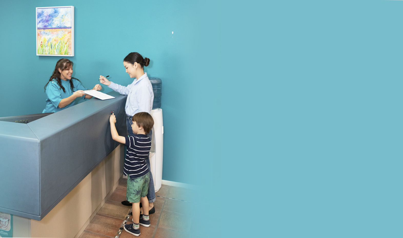 Patient checking in at the front desk