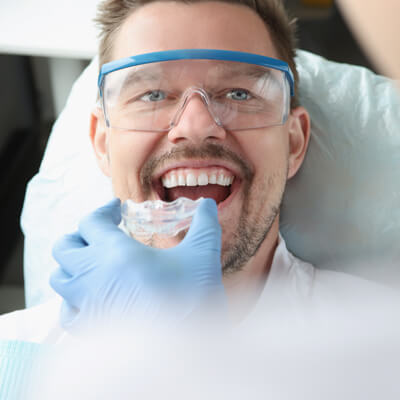 Man being fitted with a night guard splint at Princeton Dental